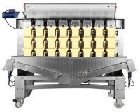 Solids and liquid packaging machine in premade pouches